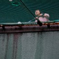 Un petit coup d'éventail avant d'enchaîner les strikes au matsuri