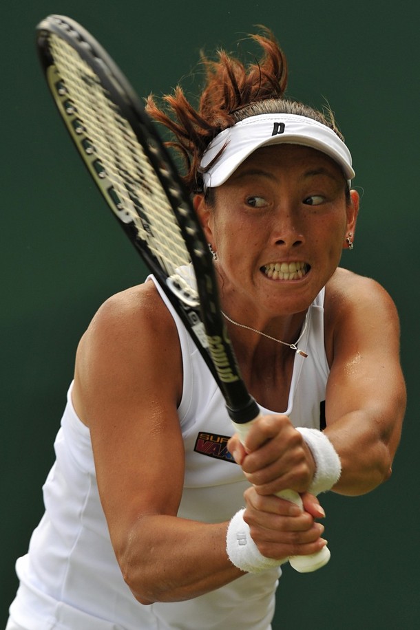 Japan's Ai Sugiyama returns a ball to Spain's Arantxa Parra Santonja during their second round match in the 2009 Wimbledon tennis championships at the All England Club on June 24, 2009. The event, the third Grand Slam tournament of 2009, runs from June 22  to  July  5, 2009. AFP PHOTO / CARL DE SOUZA (Photo credit should read CARL DE SOUZA/AFP/Getty Images)